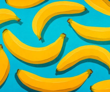 A digital illustration of multiple bananas on a light blue background.