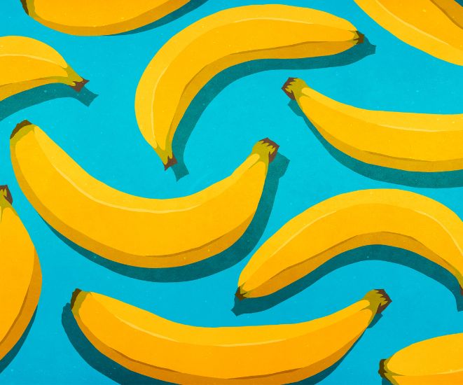 A digital illustration of multiple bananas on a light blue background.